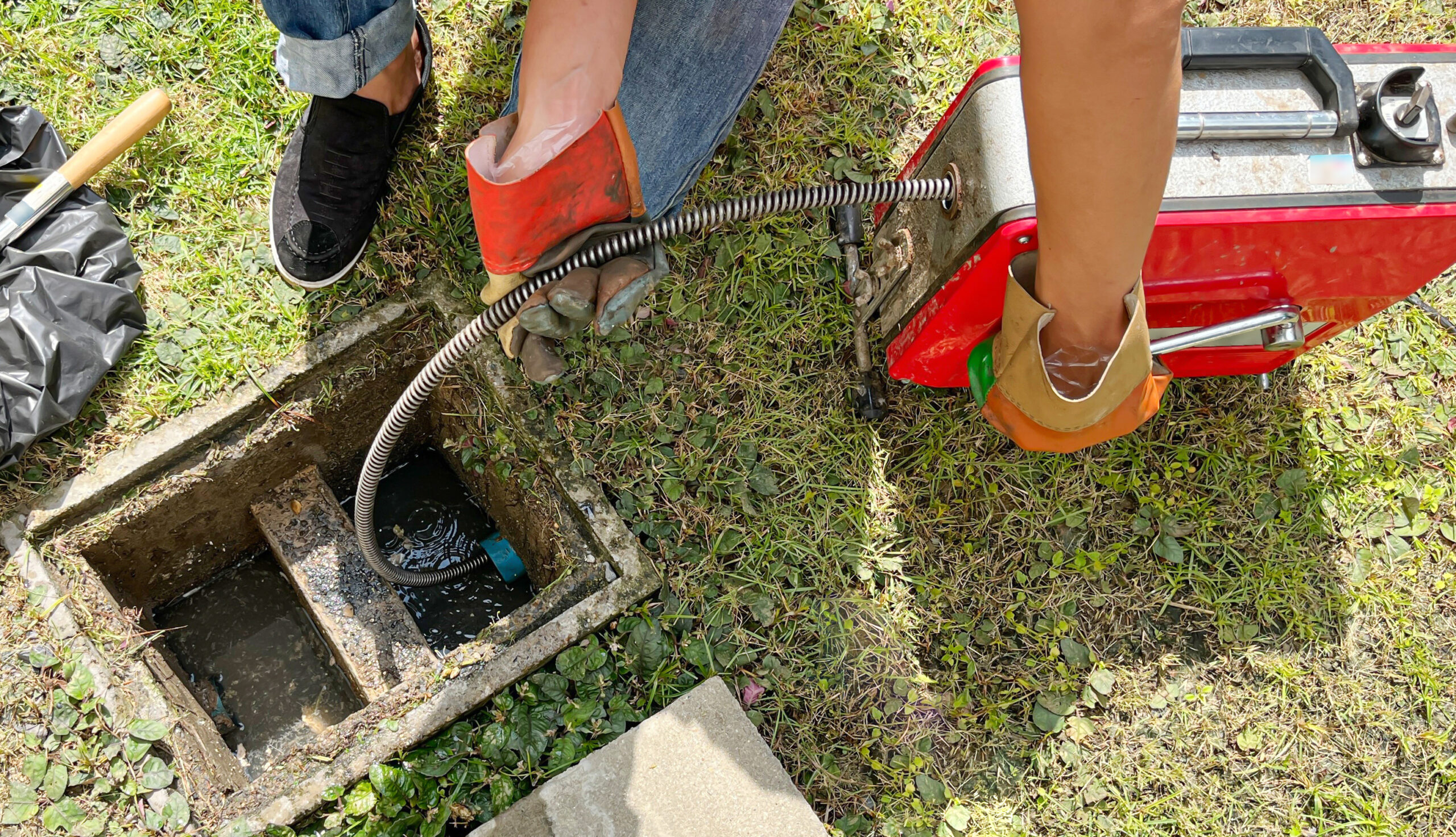 Hydro jetting service being performed from an outdoor drain access in the ground in Lansdale, PA.