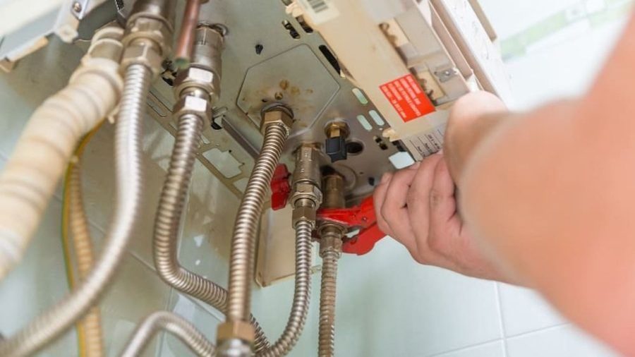 Technician working on a furnace